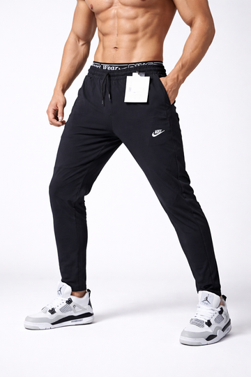 NIKE EMBROID LOGO IMPORTED TROUSER