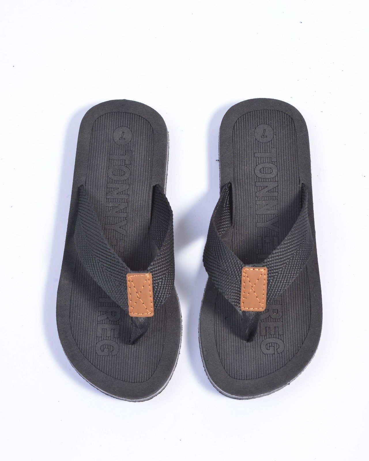 IMPRTED FLIP FLOPS IN BLACK